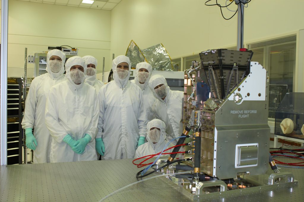 Members of the GOLD science team gather with the instrument in a LASP clean room on December 1, 2016, just after the instrument went through its pre-ship review ahead of shipment to Airbus Defence and Space in Toulouse, France. (Courtesy LASP)